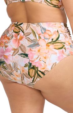 A powermesh lining provides comfortable support in bikini bottoms designed with a tropical print and full back coverage perfect for sunny pool days. Full back coverage Powermesh lining 82% recycled nylon, 18% elastane Hand wash, dry flat Imported Floral Print Stretch Swimwear With Tie-side Bottom, High Waist Tropical Swimwear For Pool, Tropical High Waist Swimwear For Pool, Tropical High-waist Swimwear For Pool, Summer Swimwear Briefs For Pool, Summer Pool Swimwear Briefs, Tropical Swim Trunks With Tropical Print, Summer Pool Swimwear In Brief Style, Beach Season Vacation Tankini With Brief