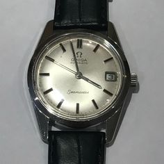 An Omega Seamaster Automatic Circa 1960 in a stainless steel case. The watch has been recently serviced by a Omega registered service shop and has a two year warrantee until June 2020. It has a spare metal strap which comes with the watch for you to have a choice. The leather strap is brand new and the metal strap is second hand. They are not Omega straps but are the correct size and genuine leather and stainless steel. Vintage Silver Watches For Business, Vintage Silver Business Watch, Silver Vintage Business Watches, Vintage Silver Watch Accessories For Business, Retro Silver Watch Accessories For Anniversary, Retro Silver Watch Accessories For Formal Occasions, Vintage Silver Automatic Watch Accessories, Mens Wrist Watches, Omega Seamaster Automatic