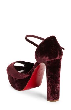 Drink up the gorgeous style of this plush velveteen sandal in a red-wine hue that's an unexpected yet complementary pairing to the iconic Louboutin-red sole. The lofty demi-block heel and chunky platform add leg-lengthening lift and heighten the retro aesthetic. 5 1/4" (130mm) heel Adjustable ankle strap with buckle closure Wipe with a soft, dry cloth and store in a dust bag Please note the red lacquer on soles will wear off as a result of normal use. To minimize the effect, avoid wearing in wet Designer Suede Platform Heels, Expensive Heels, Christian Louboutin Shoes Saks, Jimmy Choo Velvet Heels, Christian Louboutin Strappy Heels, Brown Christian Louboutin Heels, Gorgeous Style, Red Lacquer, Red Sole