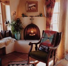 a living room filled with furniture and a fire place