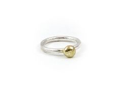 This ring is simple & yet stunningly beautiful. The two different metals sit well matched together & will look fabulous worn on its own or it lens itself well, to be stacked with other rings.  The  band is made from 2.5mm round sterling silver wire which has a beaten texture & the ball on top is 9ct gold. If you are unsure of your ring size please ask me to send you a ring sizer in the post which will be free of charge. Your ring will arrive in a cream coloured gift box. Pebble Ring, Oxidized Ring, Bespoke Rings, Shell Ring, Shell Jewelry, Ring Sizer, Shell Earrings, Beach Jewelry, Silver Hoops