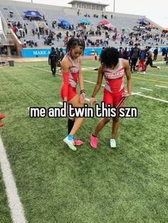 two girls in red and black uniforms on a football field with the words me and twin this szn