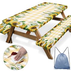 a picnic table with sunflowers on it and a blue bag next to it