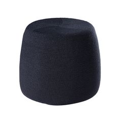 an upholstered black ottoman on a white background