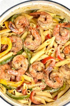 pasta with shrimp and peppers in a skillet