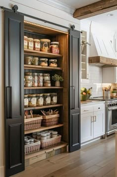 an open pantry in the middle of a kitchen