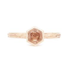 Details From our Gold for Good collection, this stunning solitaire is carved from wax and cast from Fairmined gold. A US-mined and cut hexagon-cut Oregon sunstone adorns the ethically-sourced gold band in a durable high-set bezel setting - making this ring perfect for stacking and tough enough for daily wear. This ring is ready to ship in size 9.75 Band and Width A carved woodgrain style 2.5mm wide band. Stone A 6mm 1.04ct stone. Metal Pictured here in 14K yellow gold. Stone Available with a 6mm 1.04ct peach-colored hexagon-cut Oregon sunstone (pictured) (exact dimensions may fluctuate slightly, please contact us if you have preferred specifications). Sourcing This ring is made with ethical, sustainably-sourced, and traceable Fairmined gold and US-mined gemstones. Because of their one-of-a Bevel Ring, Round Wedding Band, Oregon Sunstone, Shiny Jewelry, Rustic Rings, Band Metal, Classic Wedding Band, Hammered Band, Wedding Rings Rose Gold