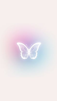 a white butterfly flying through the air on a pink blue and green blurry background