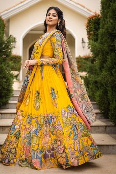 Yellow attached cancan lehenga with Vrindavan kalamkari hand painted patterns. Paired with  padded pink blouse embroidered with glass beads and kalamkari pink dupatta with contrast border. - Aza Fashions Kalamkari Lehenga, Kalamkari Dresses, Kalamkari Print, Lehenga Pattern, Lehenga Saree Design, Simple Lehenga, Long Frock Designs, Cotton Lehenga, Half Sarees