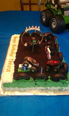 a birthday cake that is shaped like a monster truck