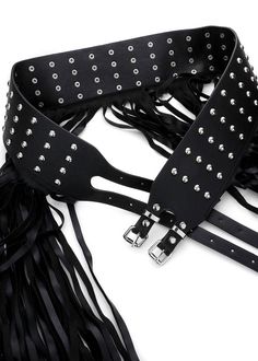 Get ready to rock your look with this rad studded fringe belt — a bold and bohemian accessory that's sure to add a touch of edge to any outfit! Crafted from soft black vegan leather with edgy studded detailing and a long fringe trim, this waist belt screams rebellious and undeniable style. Embrace your inner rockstar and let this belt be your go-to statement piece for adding a dose of attitude to your festival outfit. Whether you're heading to a music festival, hitting the club or simply elevating your everyday look, this belt is sure to turn heads and make you feel like a fashion icon. The adjustable design ensures a perfect fit, while the studded accents and fringe detailing add a touch of texture and movement to your outfit. Pair it with a band tee for a classic rock 'n' roll vibe or ad Trendy Adjustable Belts For Festivals, Edgy Adjustable Belt With Rivets, Edgy Adjustable Belts With Rivets, Black Belt With Removable Feature For Festivals, Trendy Black Belt For Festival, Adjustable Black Belt With Studs, Adjustable Black Belts With Studs, Adjustable Festival Belts With Rivets, Trendy Black Belts With Rivets