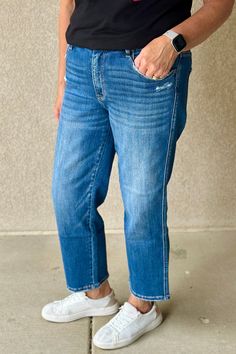 The Wayne is a high-rise ankle length straight leg jean from Lovervet. Made from comfort stretch denim, this pair features slight distressed details and a cropped length. Medium-Dark Wash Standard Sizes--Rise: 10" / Inseam: 27" / Leg Opening: 16" Plus Sizes--Rise: 12" / Inseam: 27" / Leg Opening: 18" Lovervet Style Number: LV1277 "The Wayne" Fit Notes: Lovervet Jeans fit like Judy Blue Jeans. Stick with your JB size, or size down one from a traditional department store size. Kelly is 5'6" and is Dark Wash Distressed Straight Leg Cropped Jeans, Dark Wash Mom Fit Cropped Jeans, Dark Wash Cropped Mom Jeans, Mom Fit Dark Wash Cropped Jeans With Frayed Hem, Mom Fit Denim Cropped Jeans With Frayed Hem, Everyday Dark Wash Cropped Jeans, Dark Wash Mom Fit Cropped Jeans With Tapered Leg, Dark Wash Straight Leg Mom Fit Cropped Jeans, Medium Wash Straight Cropped Mom Jeans