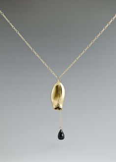 Fantastic layering necklace! Nature inspired pod drops from a long chain for a classic timeless look. Available in 3 metal options: polished sterling silver and onyx, oxidized sterling silver and onyx, 14k gold vermeil and onyx Overall length: 28” Pendant dimensions: 2.5” long x 1/2” wide Item #np16 German Jewelry, Black Onyx Necklace, Fancy Necklace, Onyx Necklace, Onyx Gemstone, Everyday Necklace, Jewelry Stand, Layering Necklace, Short Necklace