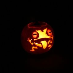 a pumpkin carved to look like a frog