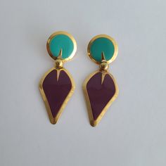 Massive Vintage Colorful Drop Earrings Purple Green Enamel Goldtone Metal Fun Bold 80s Vibe. Colorful enamel, fun and light on the ear, large drop earrings. In excellent vintage condition.  For new arrivals check out the store's Instagram account https://www.instagram.com/helensjewellerybox/ All jewelry may have light scratches due to age and wear. Thank you for looking and if you have any questions please don't hesitate to ask :) Large Drop Earrings, 80s Vibes, Earrings Purple, Green Enamel, Purple Green, Instagram Account, Jewelry Earrings Dangle, Dangle Drop Earrings, Violet