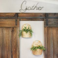 two wicker baskets are hanging on the wall