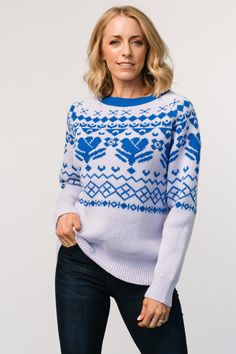 Comfortable and cozy oversized sweater Soft and stretchy sweater knit Soft light Blue with Cobalt blue Fairisle pattern Round, wide-ribbed neckline Wide ribbed cuffs and hemline Trina is 5'6, cup size 32D, size 2 and is wearing size S Cozy Oversized Sweaters, Graphic Sweaters, Fair Isle Pattern, Lucerne, Print Sweater, Light Blue Sweater, Blue Sweater, Ribbed Neckline, Sweater Women