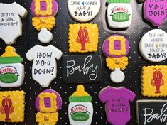 decorated cookies are displayed on a black surface with white and yellow lettering that says, how do you doin?