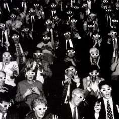 a group of people with their faces covered by blindfolded masks, all wearing suits and ties