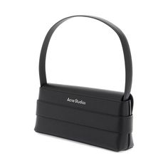 The Musubi shoulder bag by Acne Studios is a sleek and elongated design made in Italy from smooth leather, adorned with the iconic Musubi knot on the front, inspired by the Japanese Obi Sash. It features a flap closure under the knot, a leather interior with an open pocket, and an adjustable and removable handle. Obi Sash, Japanese Obi, Makeup Travel Case, Travel Makeup, Beauty Accessories, Travel Case, Leather Interior, The Knot, Plastic Bottles