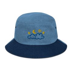 This embroidered bucket hat will soon become your favorite accessory!  The embroidered cloudy moon and star design gives this embroidered hat a personalized touch.  These denim bucket hats are super trendy, comfortable, and versatile and work with all kinds of outfits--casual, sporty, and streetwear.  Better yet, there are four different bucket hat styles to choose from. * 100% cotton * 2 sewn eyelets on each side of the hat * Poplin sweatband * One size fits most * Four different colors available: black denim, classic denim,      classic/light denim and light denim Embroidery design by me. Thank you so much for your interest in my studio! ✨💫Robbie's Design Studio💫✨ Trendy Summer Bucket Hat With Embroidered Logo, Trendy Bucket Hat With Embroidered Logo, Night Sky Embroidery, Cloudy Moon, Sky Embroidery, Moon Hat, Moon And Star Design, Bucket Hat Style, Embroidered Bucket Hat