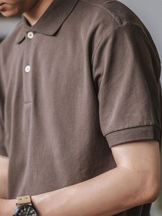 A new spin on an old classic: this stylish polo-shirt combines elegance and relevance. Look reminiscent and chic on warm days in this short sleeve-polo-shirt. Collar for smart looks. Made from 100% cotton, it's just what you need to update your style. Try the polo-shirt in classic fit for guaranteed comfort - light, casual and relaxed. FEATURES 100% Cotton Mid weight 210gsm Pique Knit 2-button, seamless french placket Tonal mother of pearl buttons Style Number:9117 SIZING & FIT Please carefully Fitted Polo Shirt With Casual Collar, Classic Collared Solid Top, Classic Collared Top, Basic Solid Polo Collar Shirt, Basic Solid Shirt With Polo Collar, Classic Collared T-shirt For Work, Classic Solid Top With Johnny Collar, Classic Cotton Plain Polo Shirt, Fitted Brown Cotton Polo Shirt