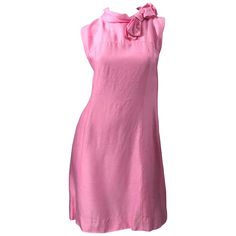 Chic 1960s bubblegum pink Jackie O style silk dress! Flattering sheath shape with a bow at top left center neck. Full metal zipper up the back with hook-and-eye closure. Perfect for any day or evening event. Pair with flats, sandals or wedges for day, and heels for evening. Very well made with lots of attention to details. In great condition Approximately Size Medium Measurements: 36 inch bust 32 inch waist 41 inch hips 36 inches from top back shoulder seam to hem 1920s Evening Gowns, 1920s Day Dress, 1960s Cocktail Dress, 1960s Mini Dress, Jackie O Style, New Look Dresses, Wool Knitted Dress, Silk Bow, Lace Bridal Gown