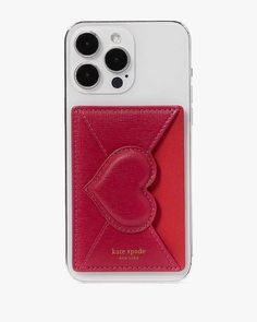 an iphone case with a red heart on the front and two black buttons in the back