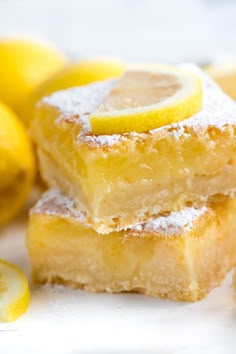 three lemon bars stacked on top of each other