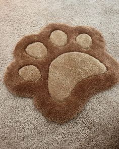 an animal paw rug on the floor