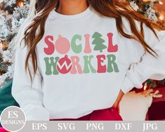 a woman standing in front of a christmas tree wearing a sweatshirt that says social worker