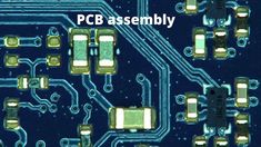 an electronic circuit board with some gold and black parts on it, including two small chip boards