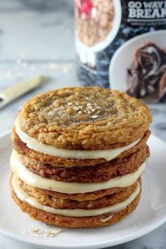 a stack of cookies sitting on top of a white plate