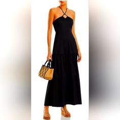 Sleeveless Halter Straps Tie At Back Neck Seamed Waist Tiered Skirt Smocked Panel At Back Waist Back Zip Closure Lined Material & Care 100% Cotton; Lining: 100% Polyester Hand Wash Black Fitted Halter Dress For Day Out, Casual Black Halter Maxi Dress, Black Casual Halter Maxi Dress, Elegant Black Halter Dress For Day Out, Casual Black Maxi Halter Dress, Sleeveless Black Halter Dress For Day Out, Black Sleeveless Halter Dress For Day Out, Fitted Black Halter Dress For Summer, Fitted Black Halter Dress For Vacation