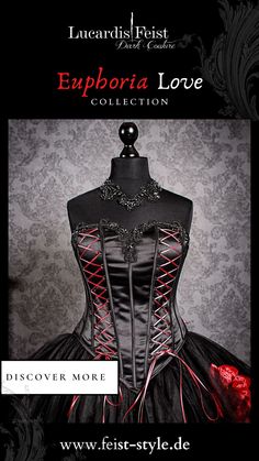 a black and red corset on display in front of a gray background with the caption explore love