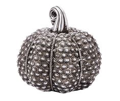 a silver beaded pumpkin on a white background