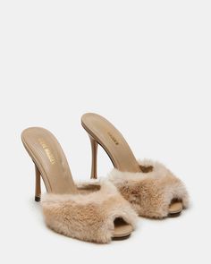 DREAMY + DELICATE + CHARMING The PRIYA sandal pairs a slender stiletto heel with a retro-inspired peep toe design on the slide strap at the front. Stiletto peep toe slide sandal Slip-on style 4.25 inch heel height Faux fur upper material Microsuede lining Leather sock Synthetic sole Imported Tennis Shoe Heels, Faux Fur Heels, Fuzzy Heels, Tan Mules, Fur Heels, Stunning Shoes, Leather Socks, Girly Shoes, Women's Heels