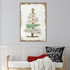 a bed with a wooden sleigh and a painting on the wall above it