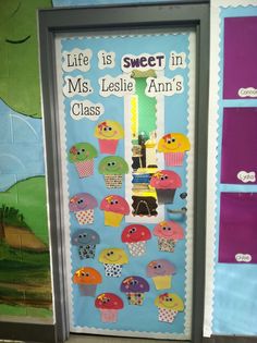 a classroom door decorated with cupcakes and frosting for the teacher's class