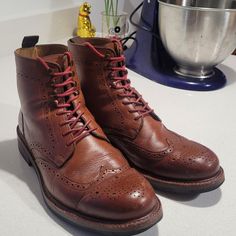 This Is A Gently Worn Pair Of Tan Nolan Boots From Beckett Simonon. -Size 9.5 -Tan -Condition: Good (Some Scuffs On Toes That Can Be Shined Out) -Material: Leather, Rubber Sole -Included Protective Neoprene Shoe Bags Further Details On Seller Website: Https://Www.Beckettsimonon.Com/Products/Nolan-Brogue-Boots Brogue Boots, Shoe Bags, Tan Brown, Rubber Sole, Men's Shoes, Shoe Boots, Man Shop, Boots, Leather