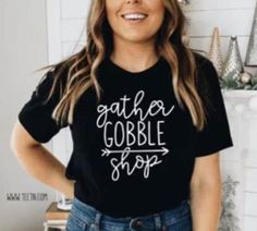 Listing:  (1) - Gather Gobble Shop (Black Friday Top)  Main listing photo:  Black shirt with white lettering.  2nd listing photo:  Deep Heather Shirt and Black Shirt both with white lettering. White shirt with Black lettering.  *Default lettering color is as shown on the sample photos. If you would like a different color, color dot chart are available selections.  Branding:  Adult: Bella Canvas/Next Level  Youth: Bella Canvas/Next Level  Toddler: Rabbit Skins  Infant: Rabbit Skins *Sizing 24 mon Black Friday Shopping, Thanksgiving Outfit, One Piece Bodysuit, Trendy Tops, Matching Shirts, Cotton Tops, White Shirt, Black Friday, Shirt Shop