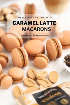 some macarons are sitting on a table with the words new recipe on the blog caramel latte macarons