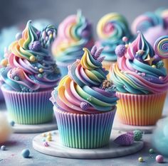 colorful cupcakes with frosting and sprinkles