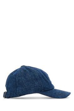 the denim cap is made from an old pair of jeans and has a button on the side