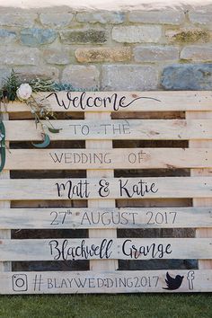 a wooden pallet sign that says welcome to the wedding of matt & kate and rachel george