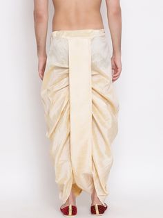 VM By VASTRAMAY Men's Gold Embroidered Dhoti Pant The VM By VASTRAMAY Men's Gold Embroidered Dhoti Pant is a perfect blend of traditional aesthetics and modern comfort. Designed with intricate embroidery, this dhoti pant is ideal for festive occasions, weddings, and cultural events. The luxurious gold hue adds a regal touch to your attire, making you stand out in any crowd. Key Features Elegant gold color with intricate embroidery Comfortable fit for all-day wear Perfect for festive and cultural Traditional Festive Pants With Dabka, Traditional Eid Bottoms With Drape, Traditional Drape Bottoms For Eid, Traditional Embroidered Bottoms For Diwali, Traditional Harem Pants For Festive Occasions, Traditional Harem Bottoms For Festive Occasions, Traditional Festive Harem Pants, Traditional Bottoms For Wedding And Festivals, Traditional Pants With Zari Work And Drape