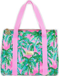 a pink and green bag with palm trees on it