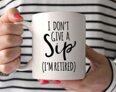 a woman is holding a coffee mug with the words there may be wine in here