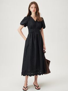 This is We’Dee’s maxi dress offers a feminine look with its clean design, yet the lovely polka dot pattern adds a touch of charm. With its V-neck design, it exudes a feminine vibe, while the puff sleeves add a unique flair to the look. Made from a cool fabric, it's perfect for wearing during hot summer days.- Perfect for daily wear- Can be paired with different styles of accessorize to create various looks- The clean design makes it easy to style with any outfit Elegant Broderie Anglaise Maxi Midi Dress, Broderie Anglaise Maxi Dress, Elegant Short Sleeve Midi Dress With Broderie Anglaise, Elegant Short Sleeve Broderie Anglaise Midi Dress, Embroidery Maxi Dress, Maxi Dress Black, Feminine Look, Polka Dot Pattern, Cool Fabric