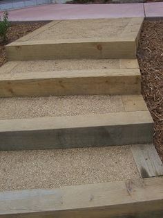 the steps are made out of wood and cement